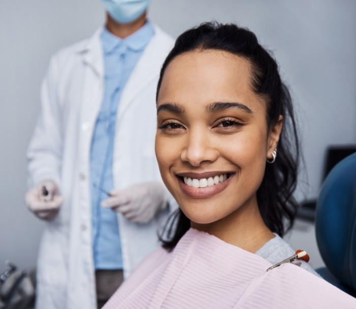 Smiling woman sitting in dental chair